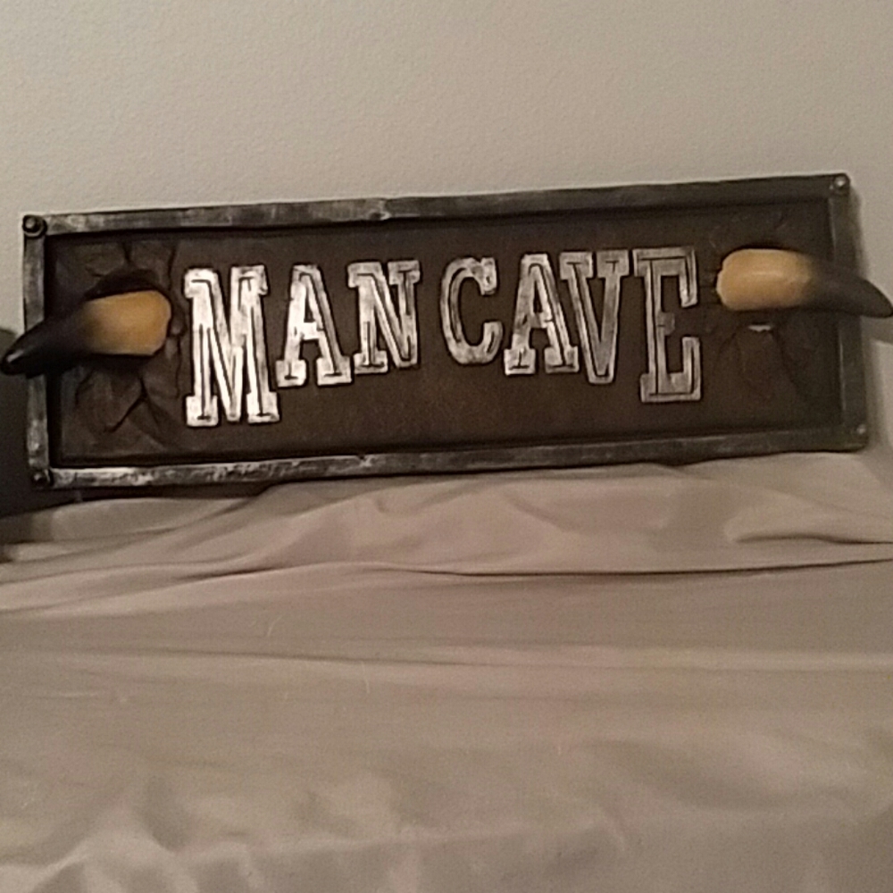 Man cave sign. Bull horns